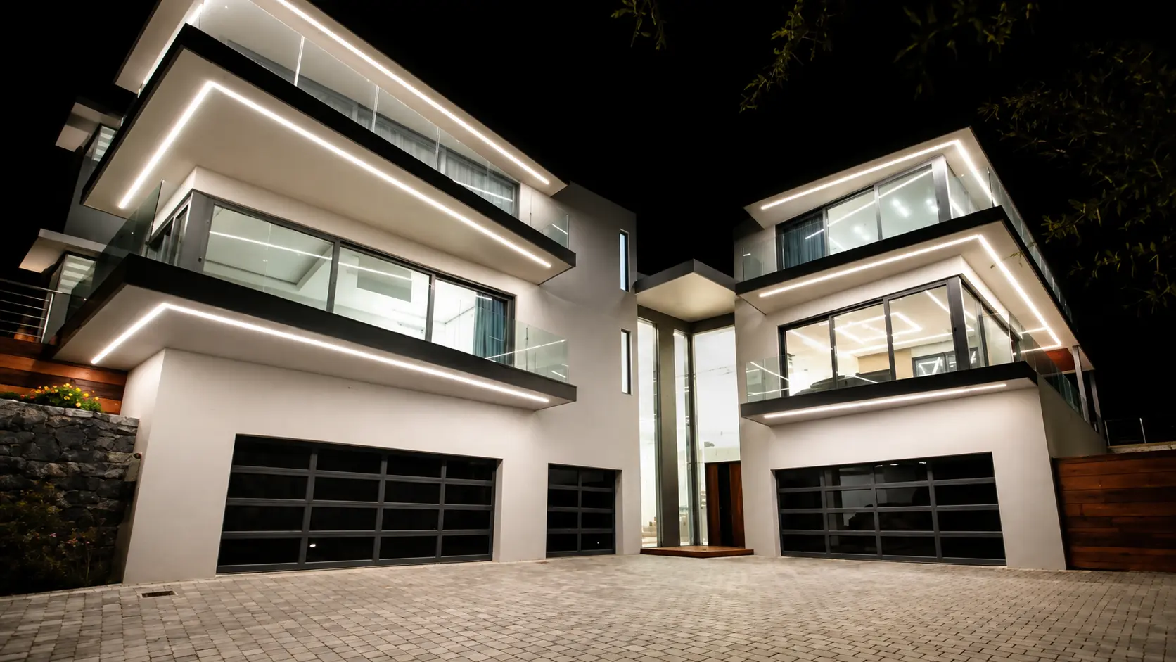 Baronetcy Estate residence illuminated at night with aluminium windows and doors