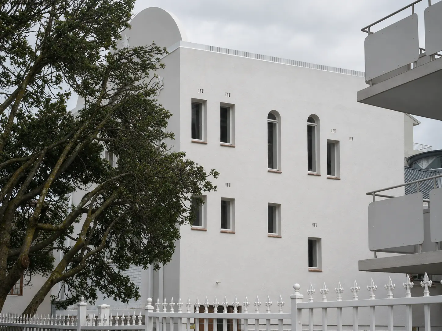 Completed side elevation with the original steel windows restored at Beit Midrash Morasha