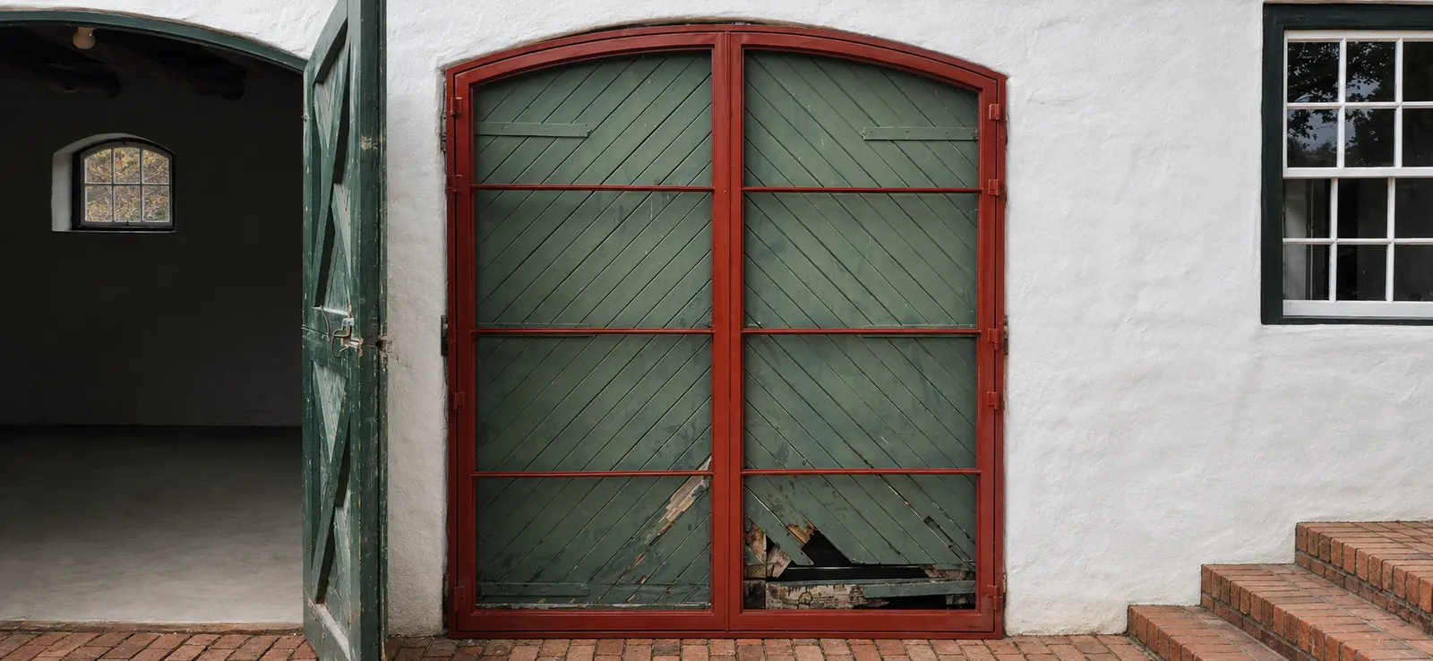 Original timber double doors before replacement at the Constantia project
