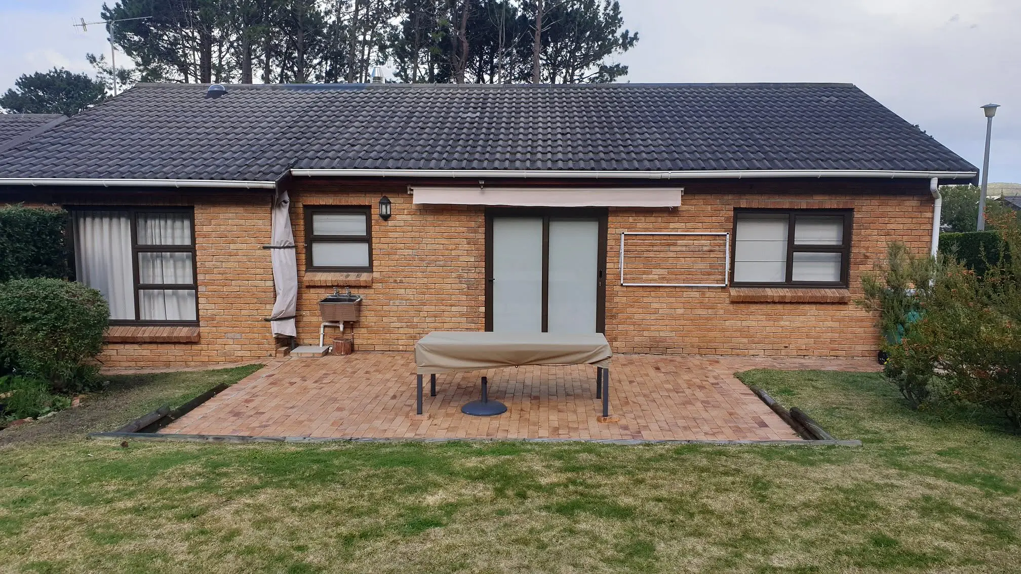 Original timber-window elevation before replacement at Lagoon Edge Hermanus
