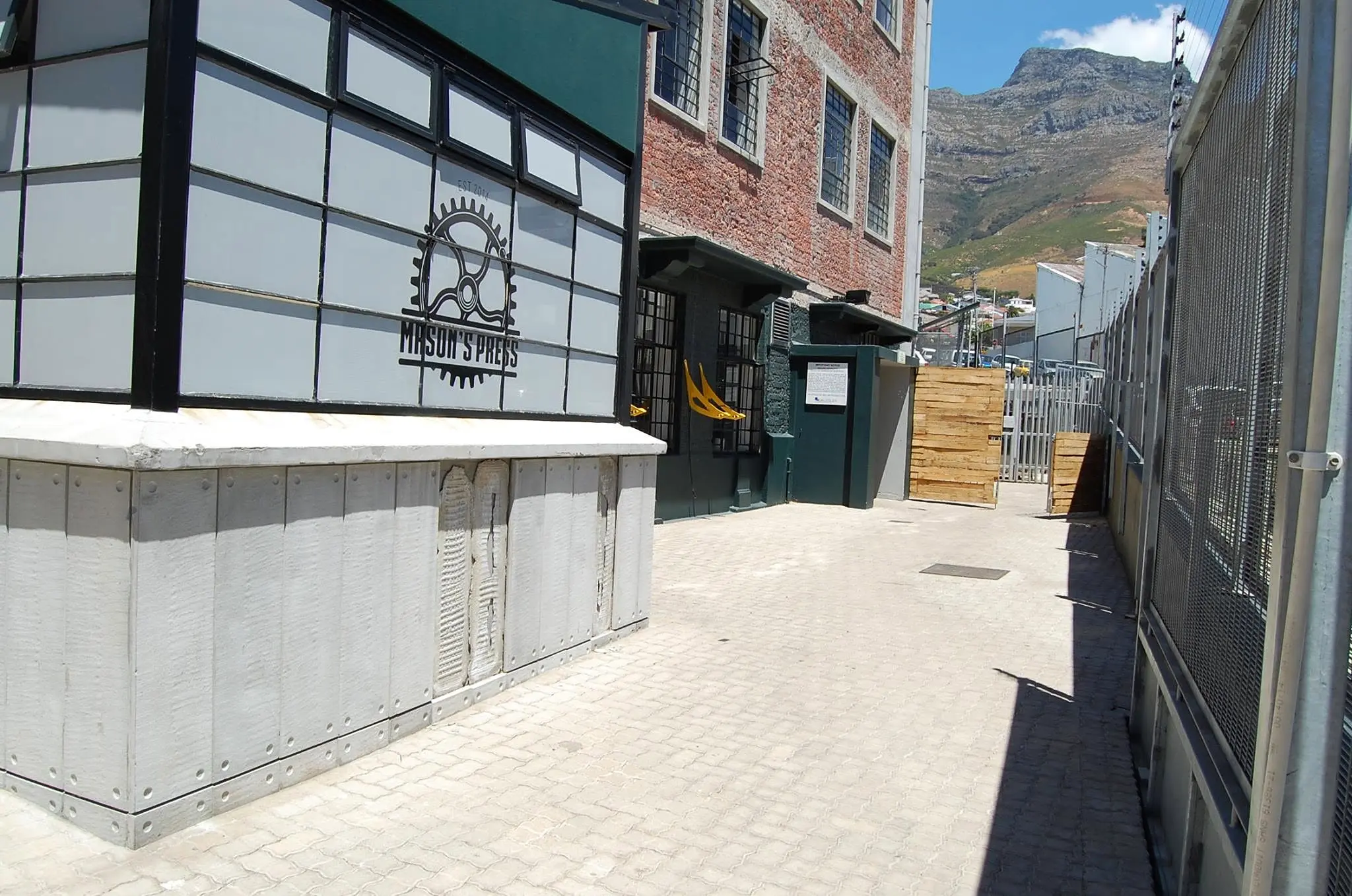 Mason's Press entrance and original steel windows with Devil's Peak beyond