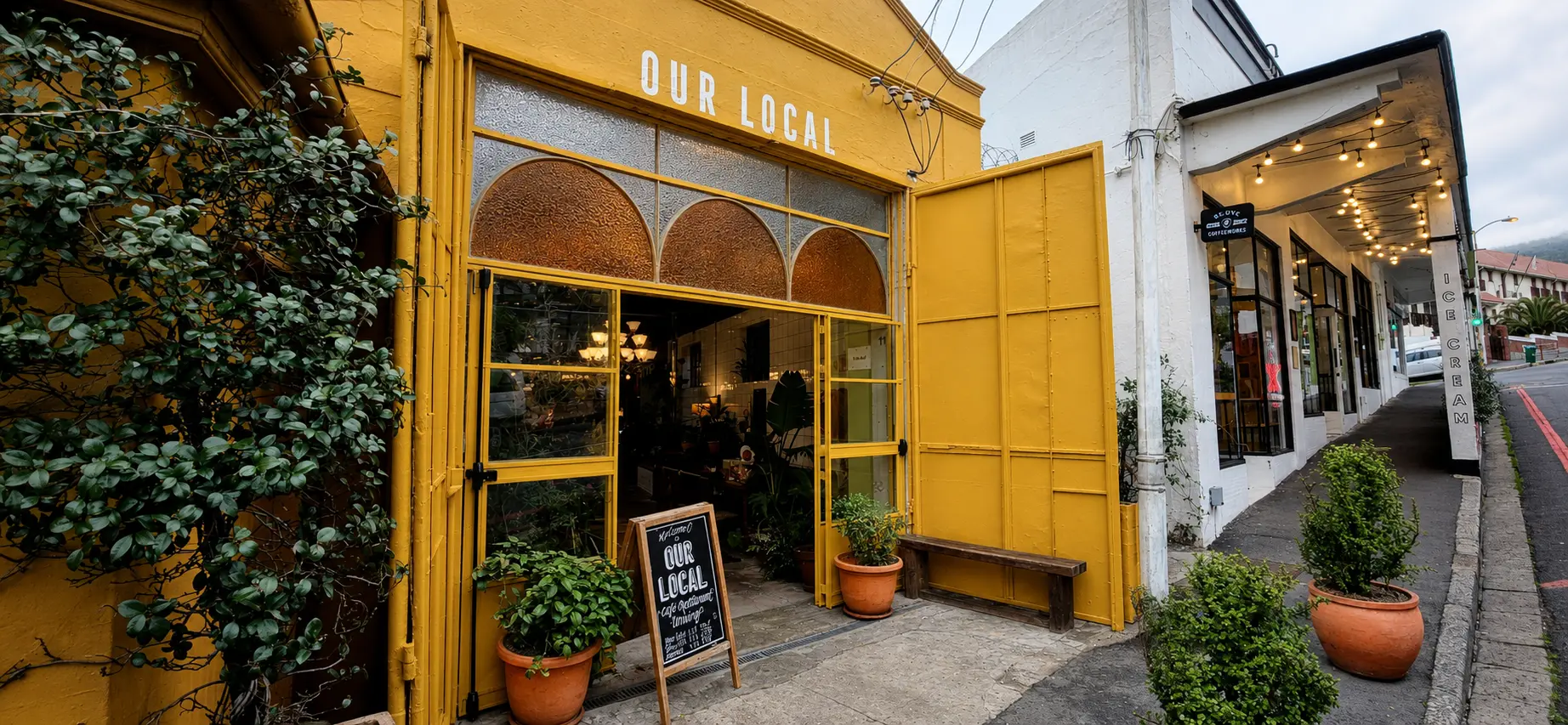 Completed Our Local steel shopfront viewed from the pavement