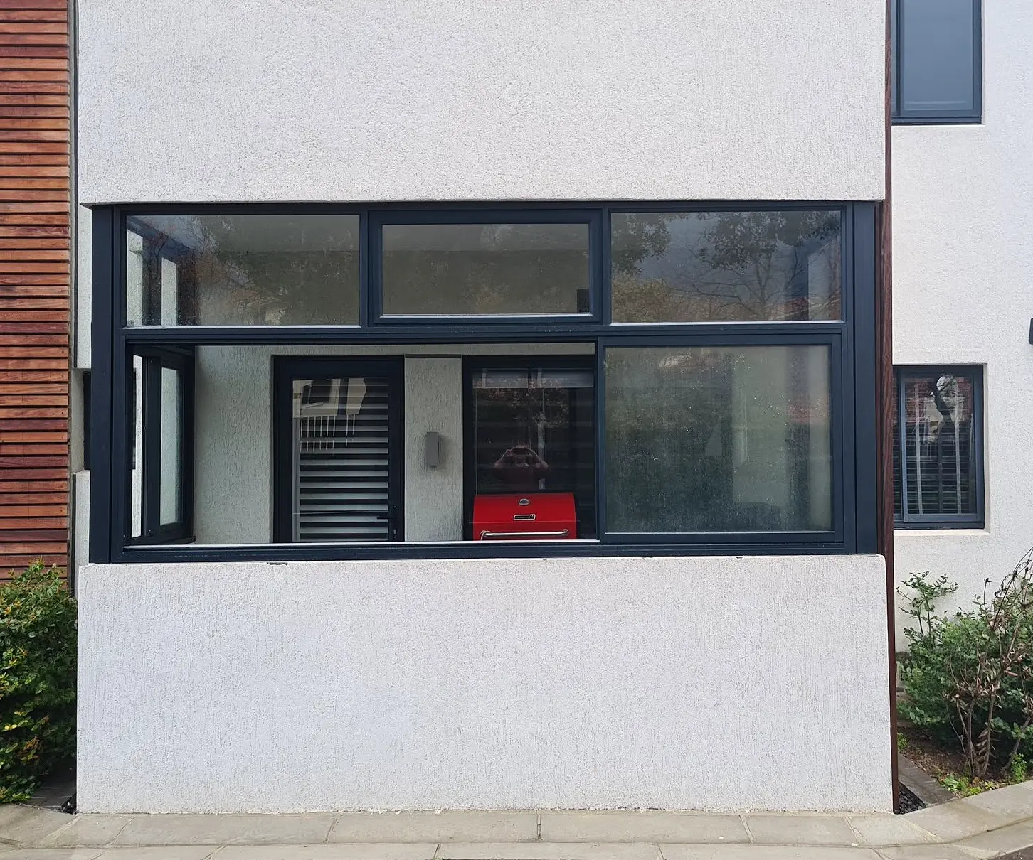 Detailed front view of the Elite sliding windows in Clip 44 frames in Plumstead