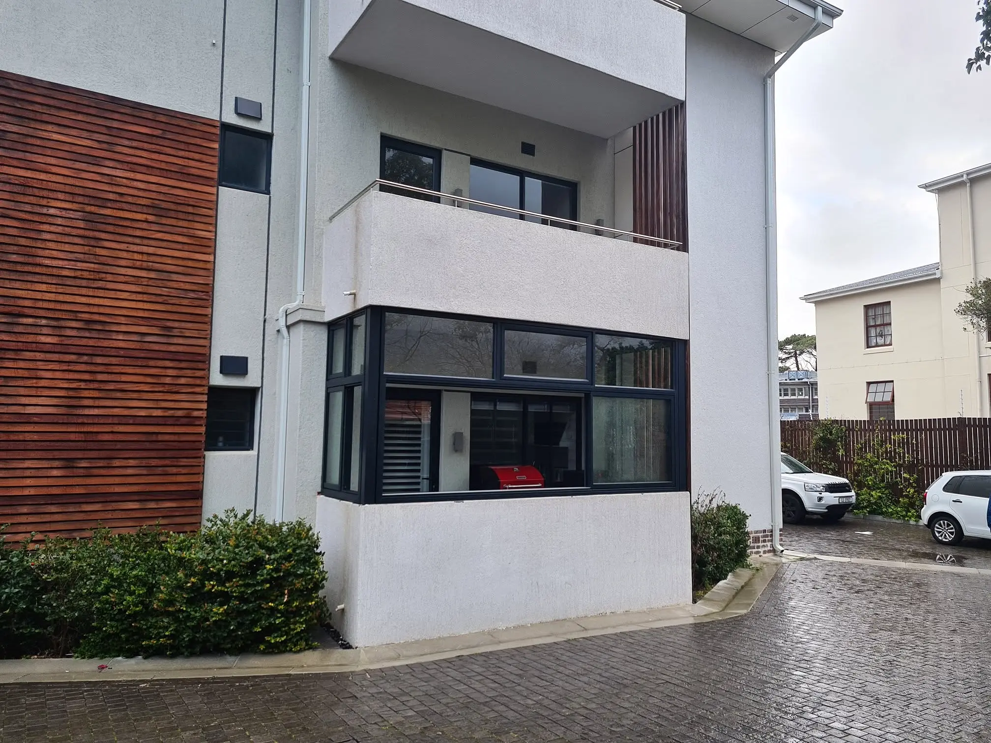 Oblique completed view of the charcoal aluminium enclosure in Plumstead
