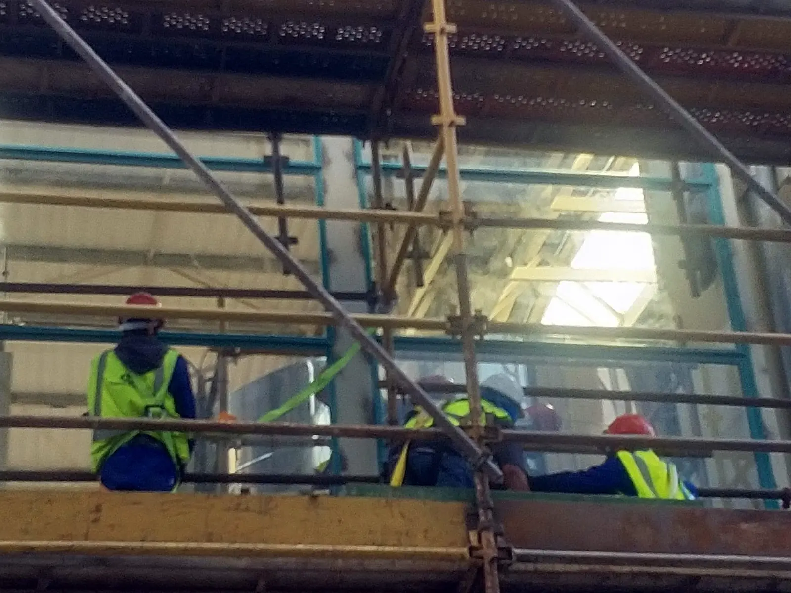 D&G team servicing industrial steel windows from the scaffold in Rosslyn